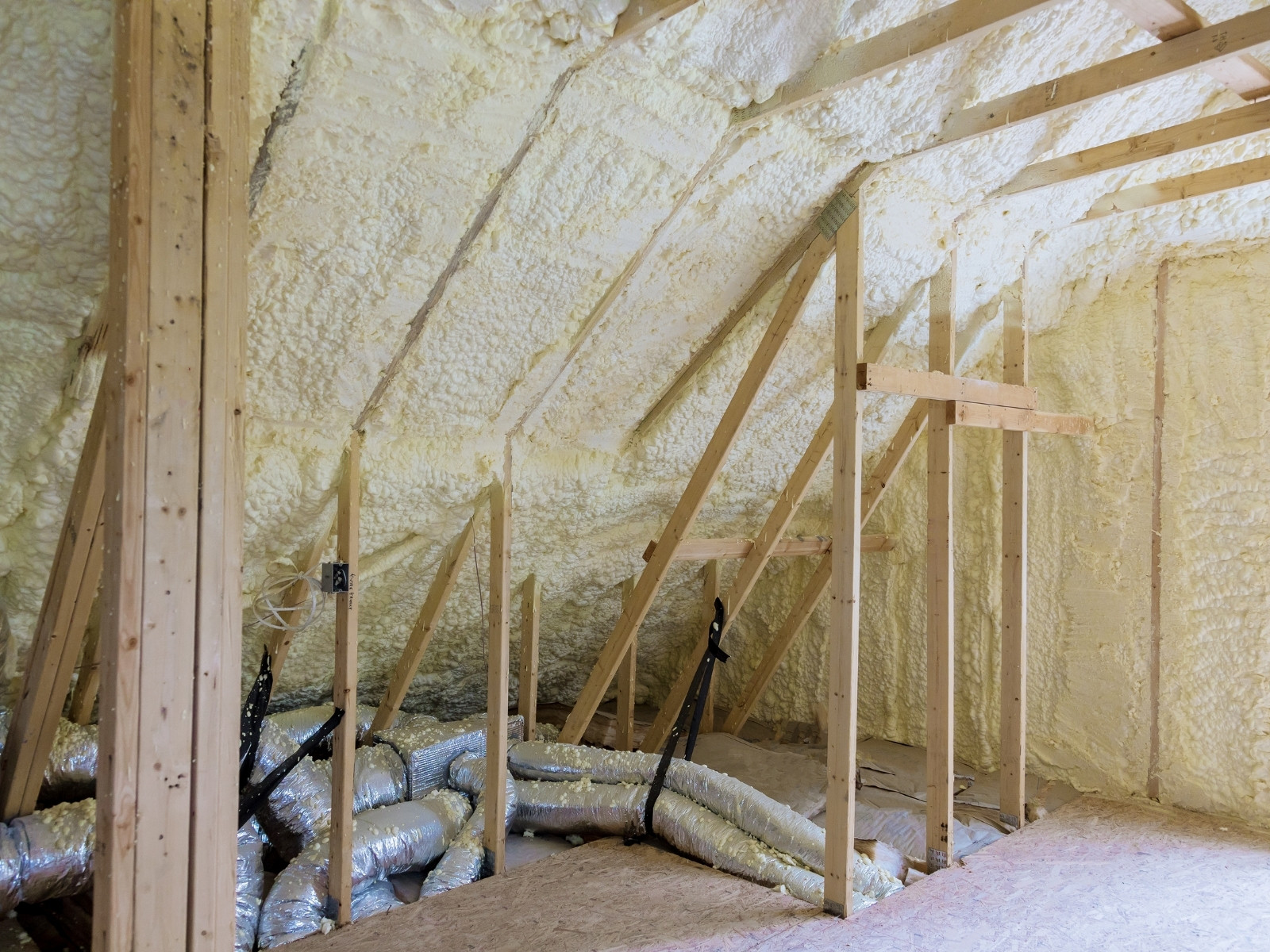 professional duct cleaning technician connecting truck-mounted vacuum equipment to a Plano TX home vent