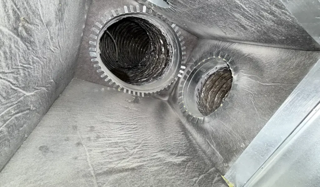 Clean metal air ducts after Air Busters professional duct cleaning in DFW